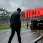 O técnico Rúben Amorim vestindo um terno escuro do Manchester United